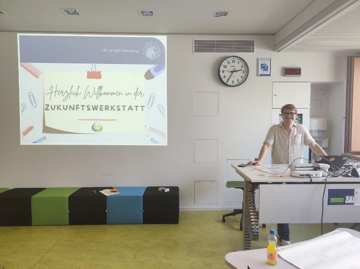 Präsentationsfolie „Herzlich Willkommen in der Zukunftswerkstatt" zu Beginn der Veranstaltung